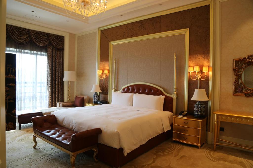Postel nebo postele na pokoji v ubytování Wyndham Grand Xi'an South