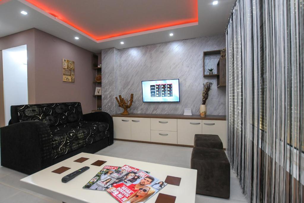 TV a/nebo společenská místnost v ubytování Mokka House