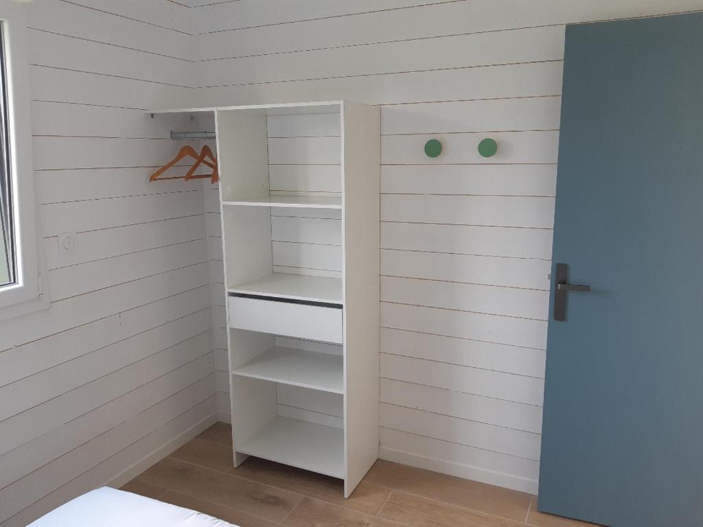 Postel nebo postele na pokoji v ubytování ETABLISSEMENT CHEZ JULES