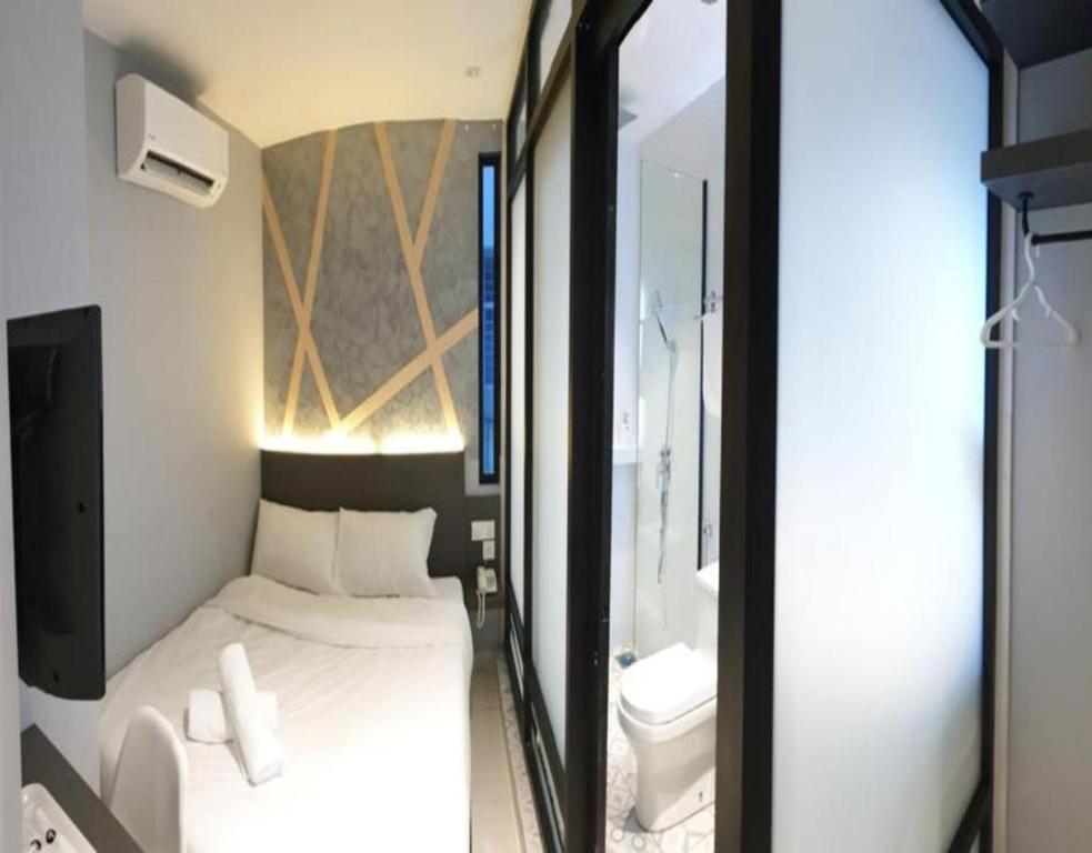 Katil atau katil-katil dalam bilik di Suite Dreamz Hotel Banting