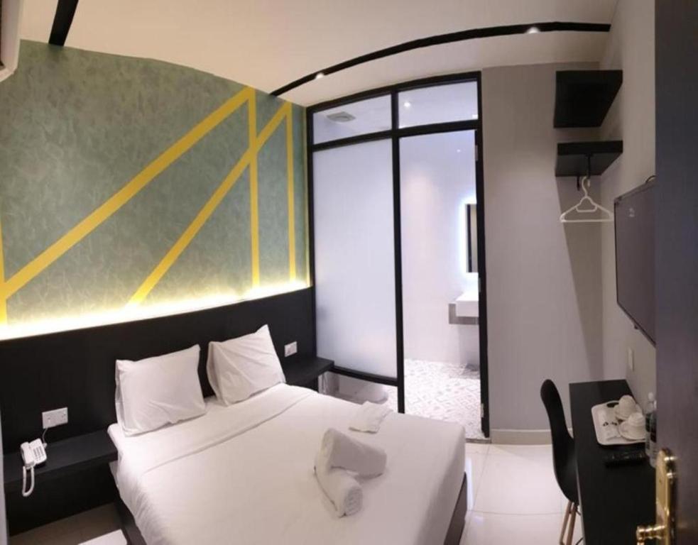 Katil atau katil-katil dalam bilik di Suite Dreamz Hotel Banting