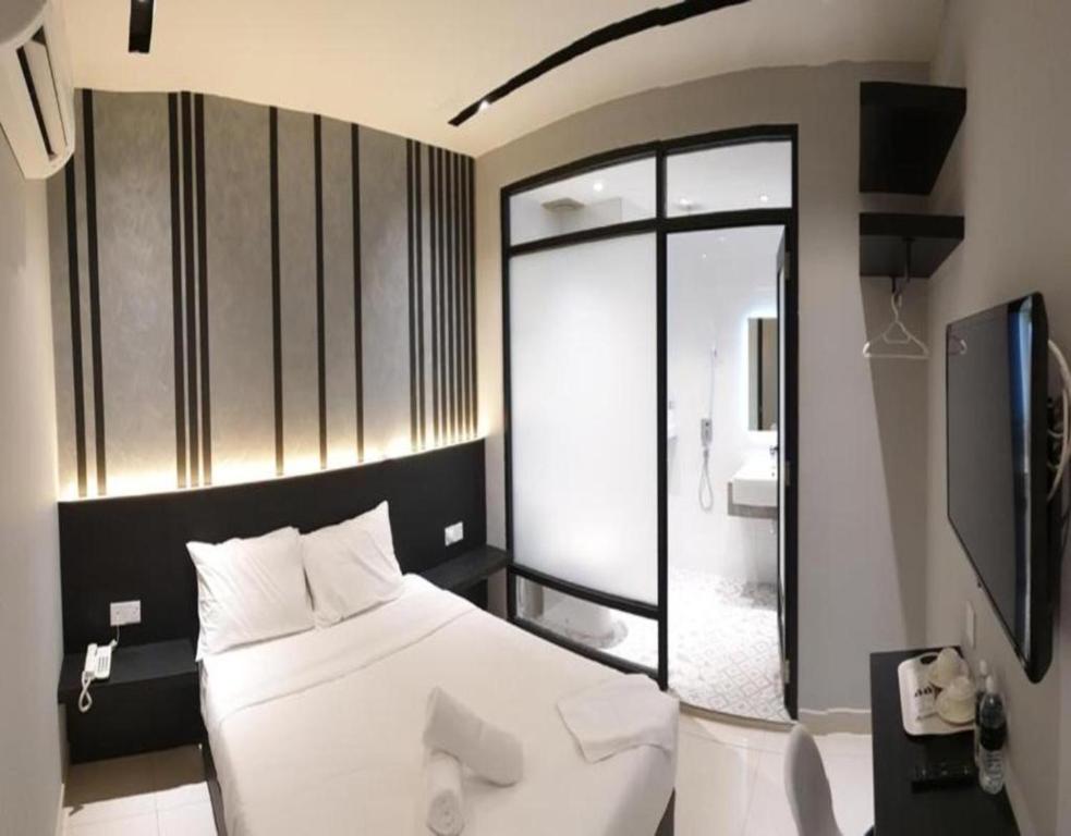 Katil atau katil-katil dalam bilik di Suite Dreamz Hotel Banting