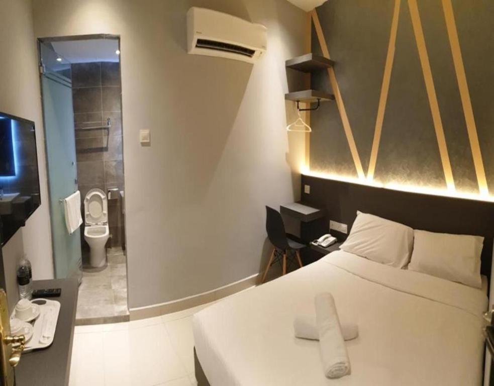 Katil atau katil-katil dalam bilik di Suite Dreamz Hotel Banting