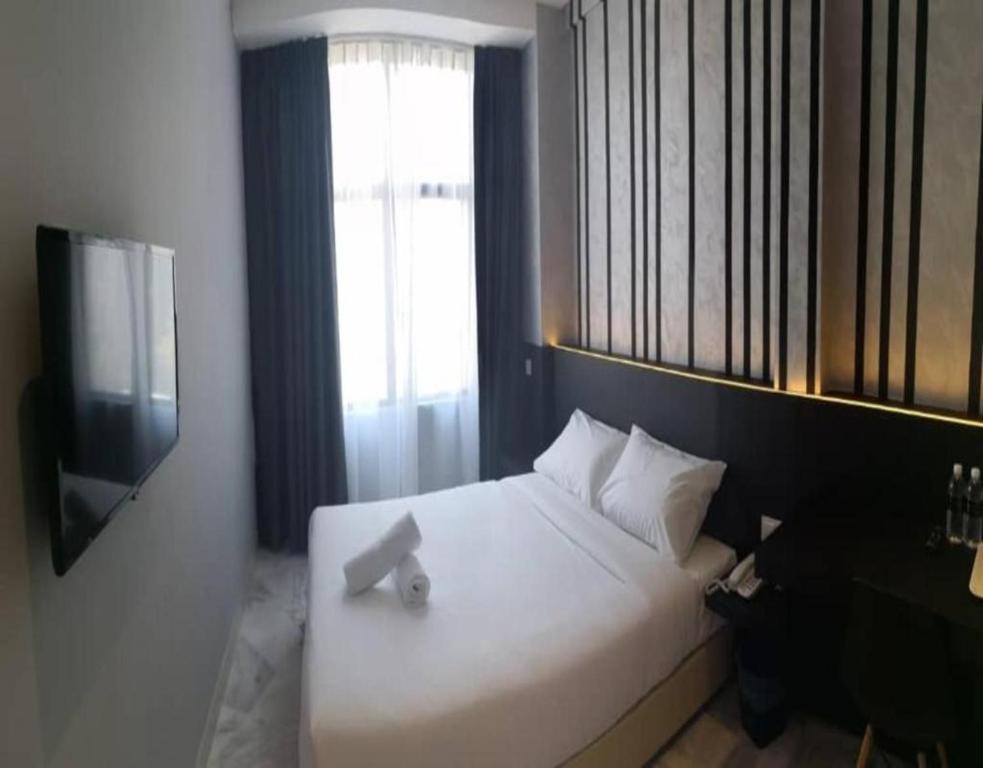 Katil atau katil-katil dalam bilik di Suite Dreamz Hotel Banting
