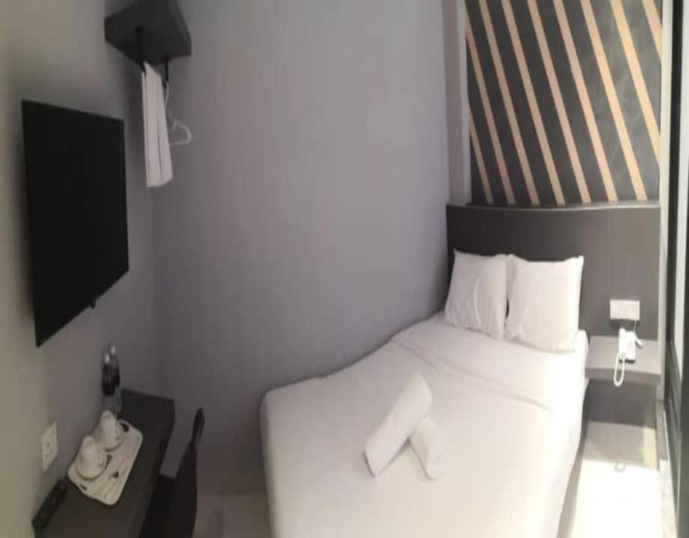 Katil atau katil-katil dalam bilik di Suite Dreamz Hotel Banting