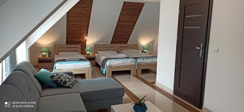 Кровать или кровати в номере Wasielówka