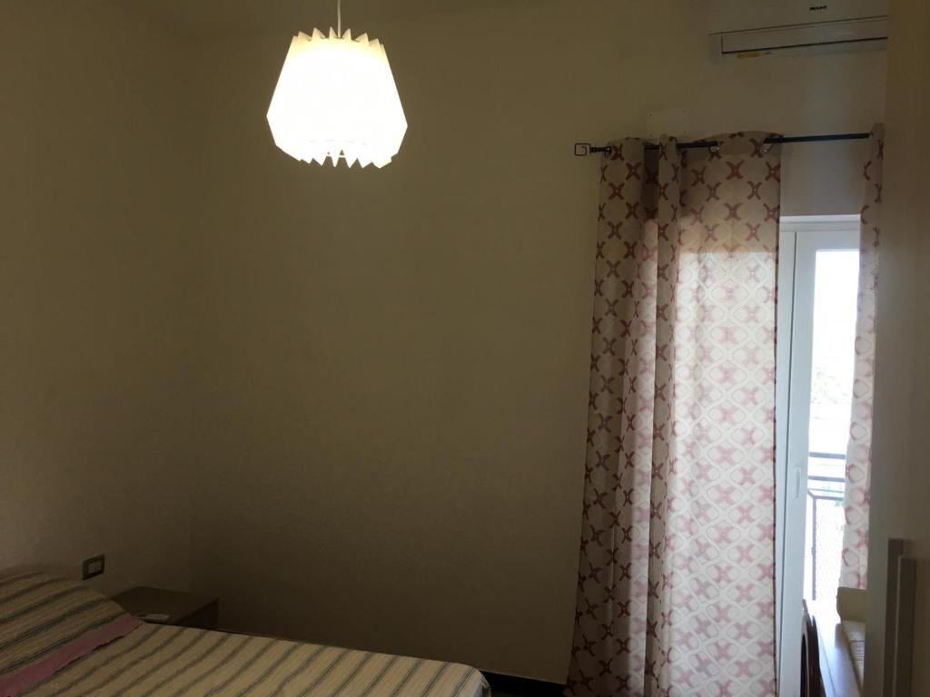 Postel nebo postele na pokoji v ubytování Residenza Rogiò