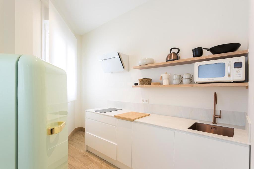 Kuchyň nebo kuchyňský kout v ubytování Getaria Apartamentuak - Balentziaga