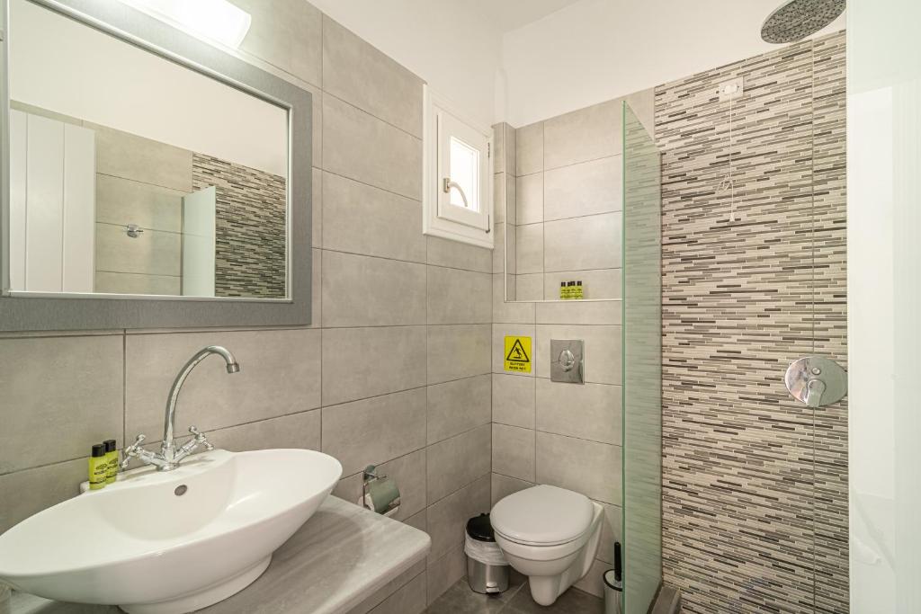 Koupelna v ubytování Marianna Hotel