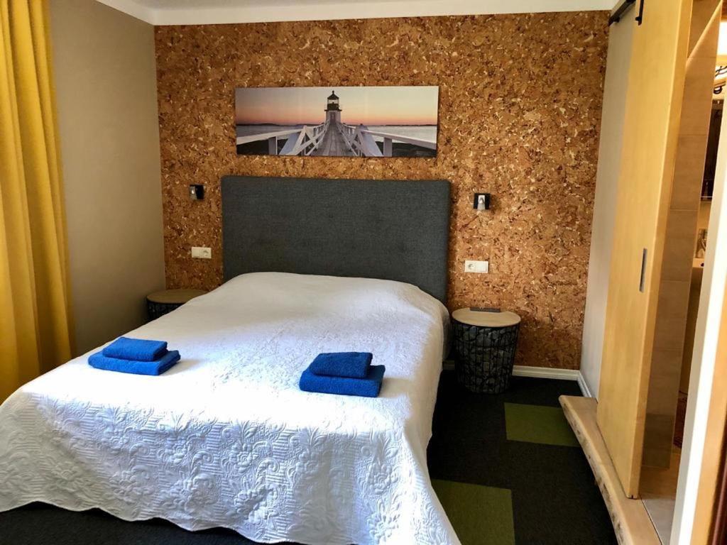 Postel nebo postele na pokoji v ubytování Veeriku Villa