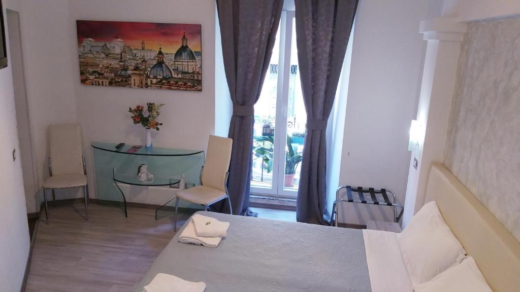 Posteľ alebo postele v izbe v ubytovaní B&B A Home in Rome