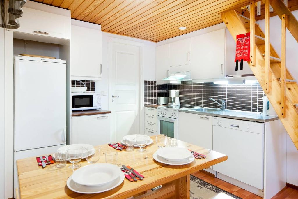 Kuchyň nebo kuchyňský kout v ubytování Holiday Club Saariselkä Apartments