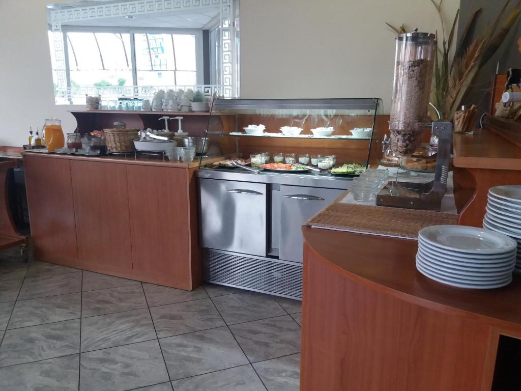 Kuchyň nebo kuchyňský kout v ubytování Hotel Filoxenia Beach