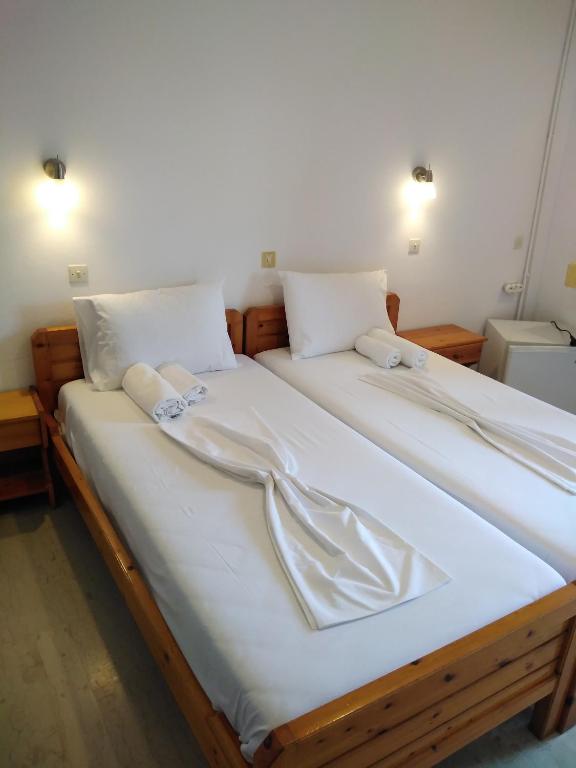 Postel nebo postele na pokoji v ubytování Ηotel Della