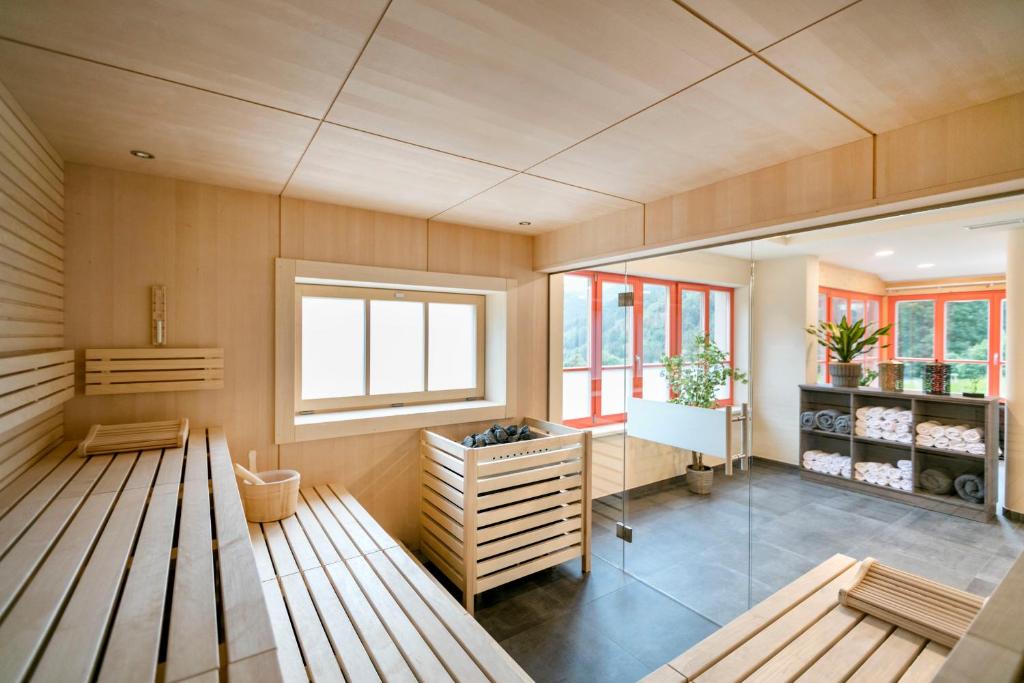 Posezení v ubytování JUFA Hotel Eisenerzer Ramsau