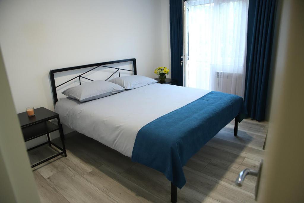 Postel nebo postele na pokoji v ubytování Central Guesthouse Gyumri