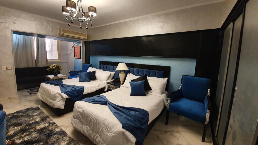 Postel nebo postele na pokoji v ubytování Indiana Hotel