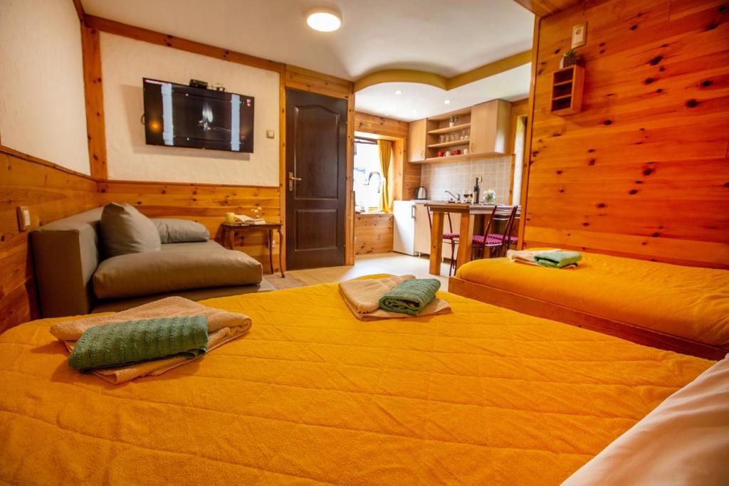 Postel nebo postele na pokoji v ubytování Apartments Tango