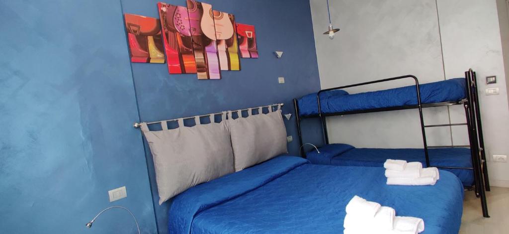 Postel nebo postele na pokoji v ubytování B&B SanRock