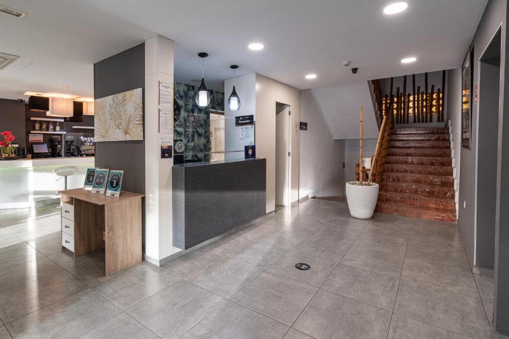 Kuchyň nebo kuchyňský kout v ubytování Hotel Golden