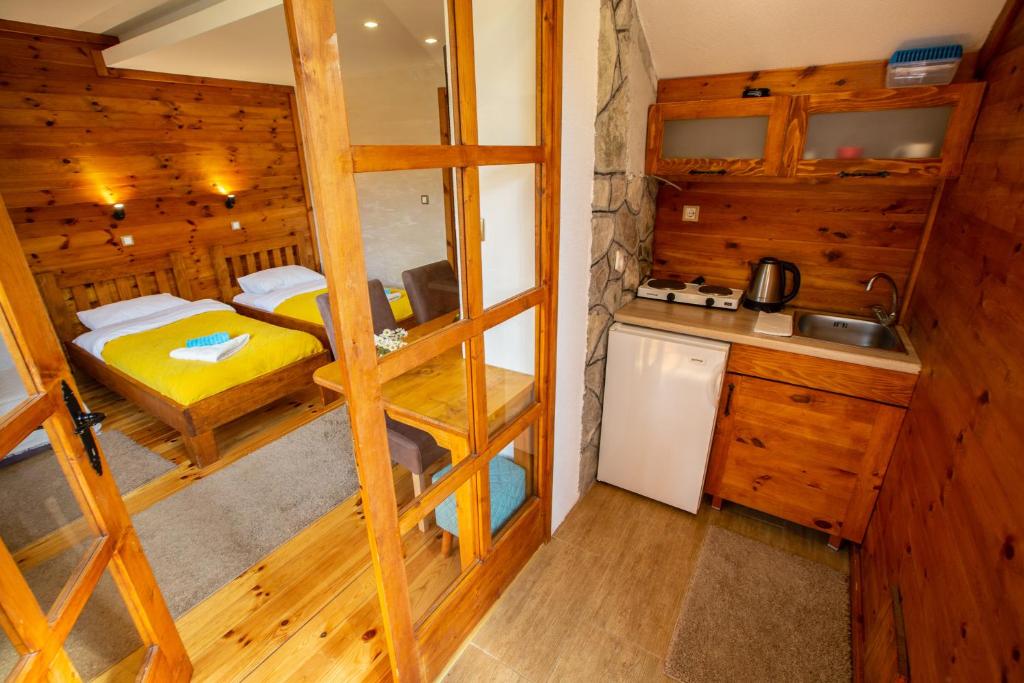 Kuchyň nebo kuchyňský kout v ubytování Apartments Tango
