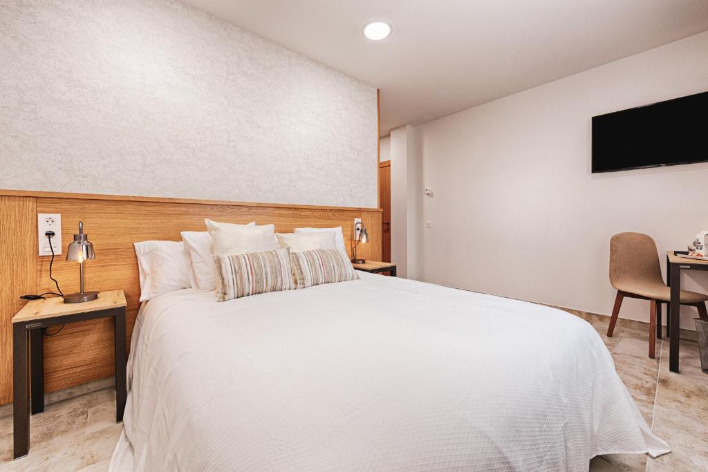 Posteľ alebo postele v izbe v ubytovaní Hotel rural La Tejera