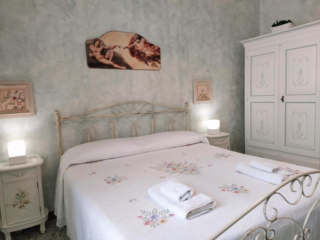 Letto o letti in una camera di Serendipity Room Lecce, vicinissima al centro