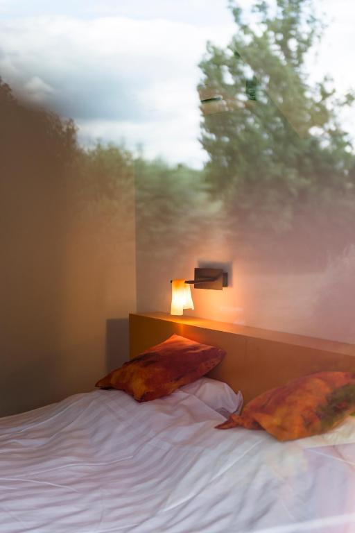 Postel nebo postele na pokoji v ubytování B&B Hier en Nu