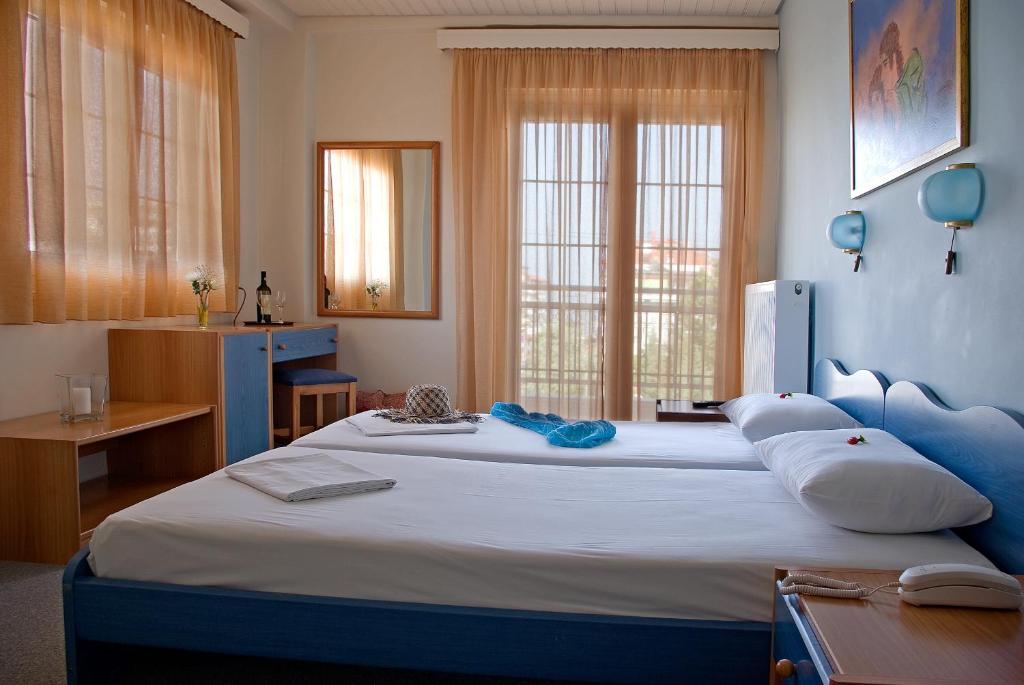 Postel nebo postele na pokoji v ubytování Hotel Europe