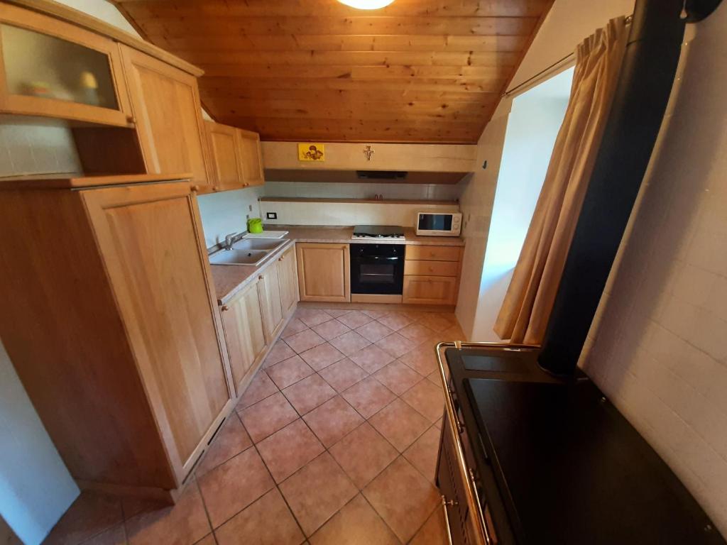 Kuchyň nebo kuchyňský kout v ubytování Casa Pergher