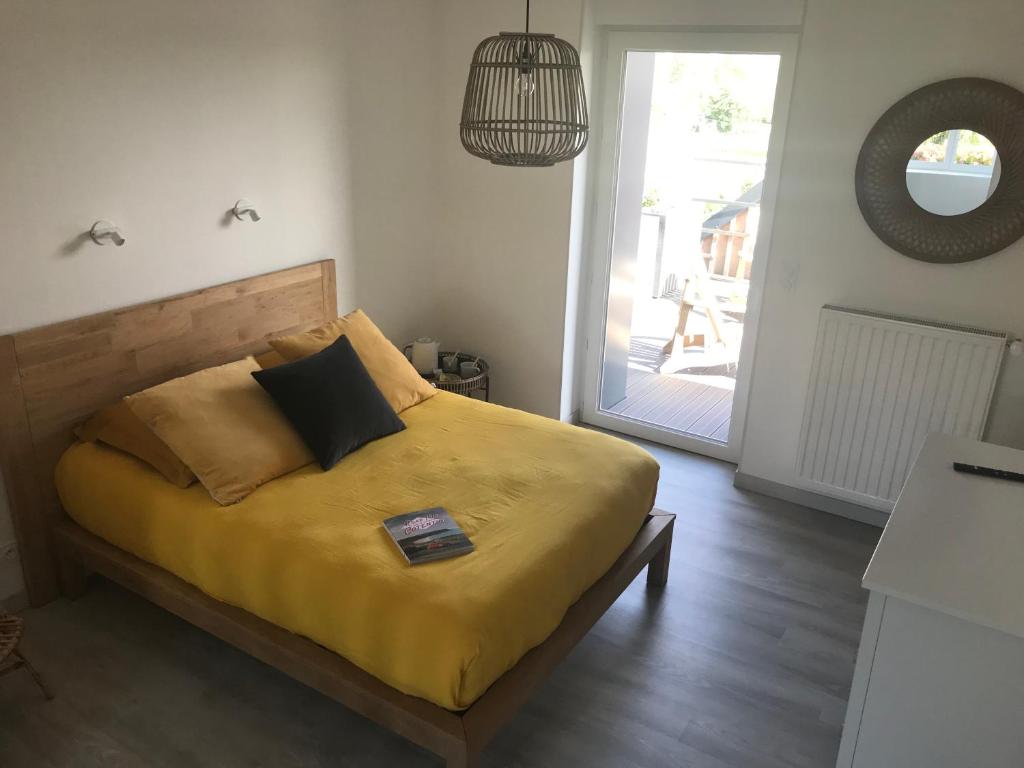 Postel nebo postele na pokoji v ubytování Etoile du Kap
