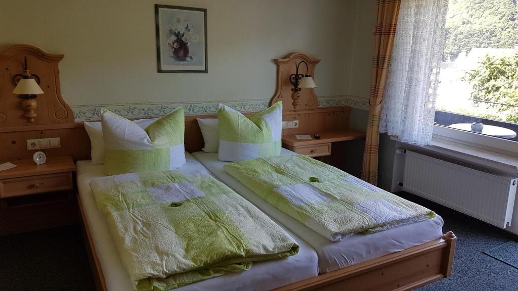 Postel nebo postele na pokoji v ubytování Brunnenhof