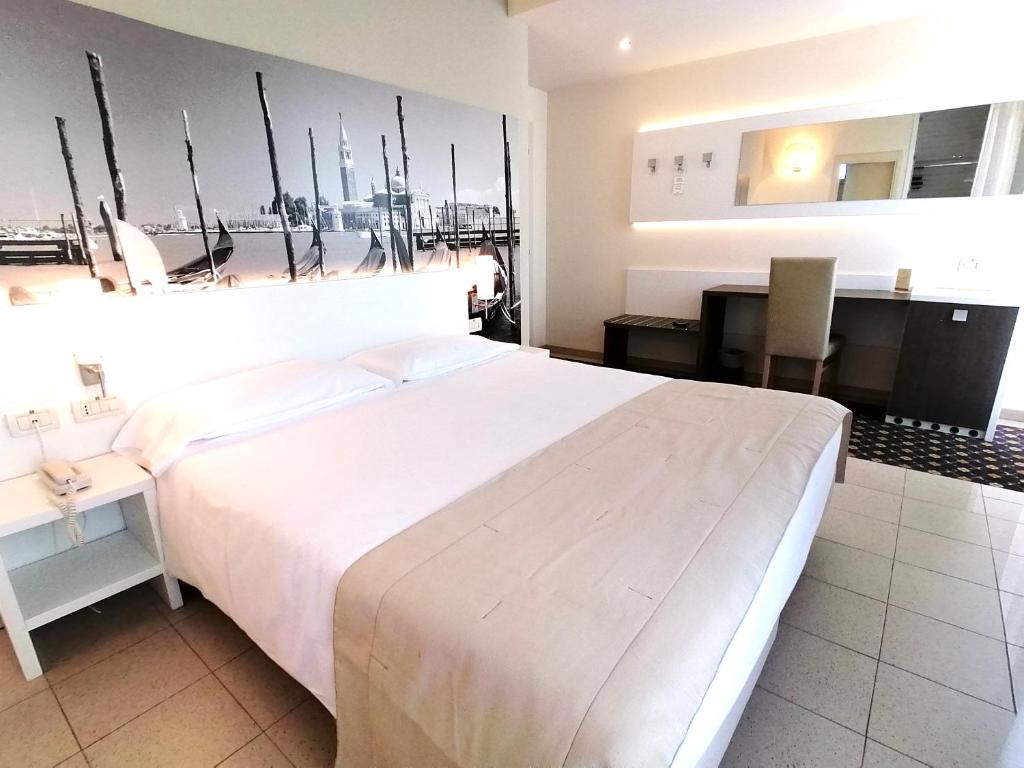 Postel nebo postele na pokoji v ubytování Palace Hotel Regina