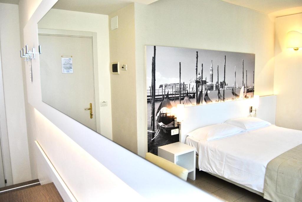 Postel nebo postele na pokoji v ubytování Palace Hotel Regina
