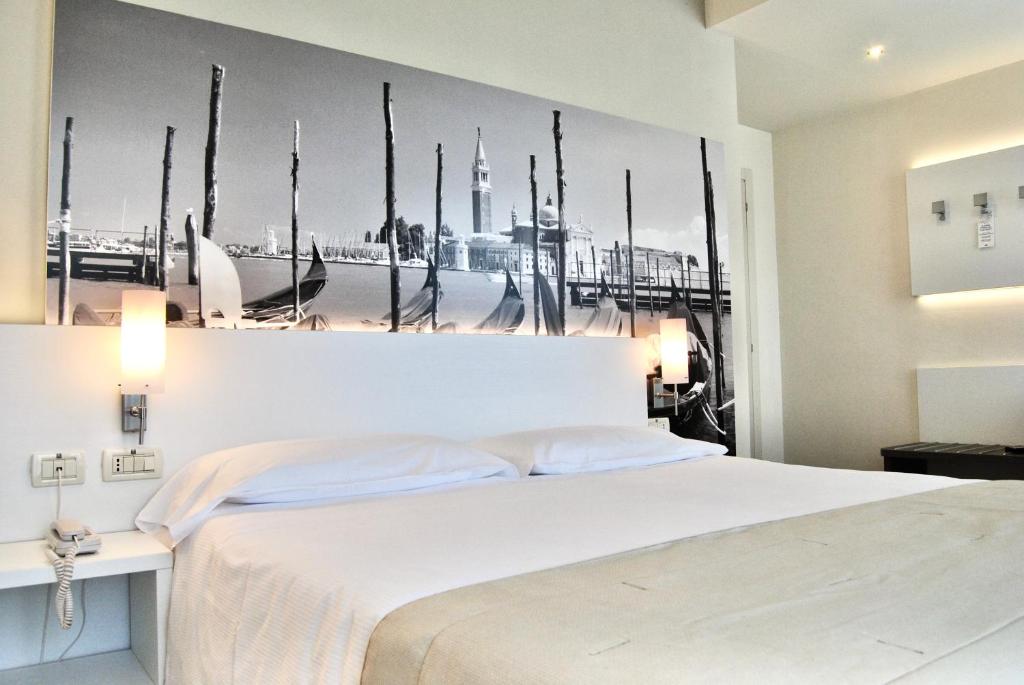 Postel nebo postele na pokoji v ubytování Palace Hotel Regina