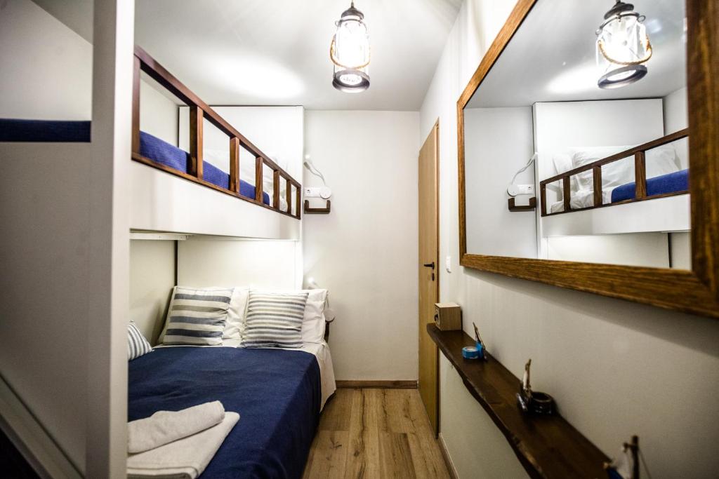 Postel nebo postele na pokoji v ubytování Bella Casa