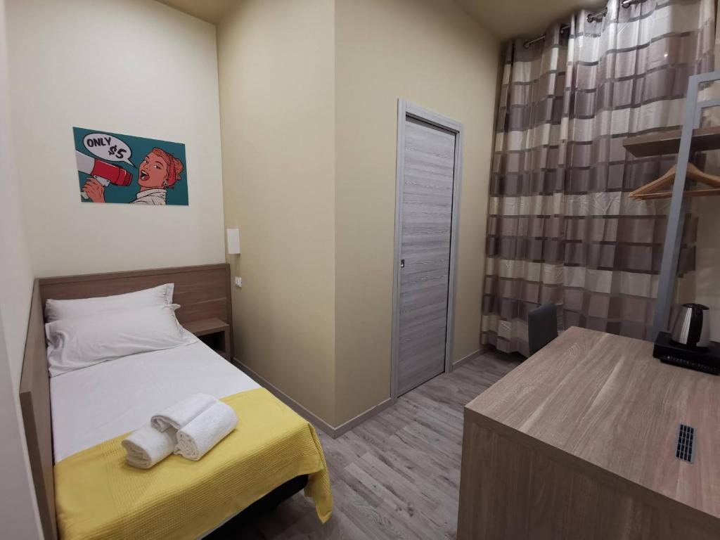 Postel nebo postele na pokoji v ubytování A&B Affittacamere a Boccadasse