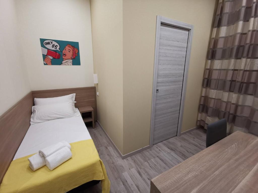Postel nebo postele na pokoji v ubytování A&B Affittacamere a Boccadasse