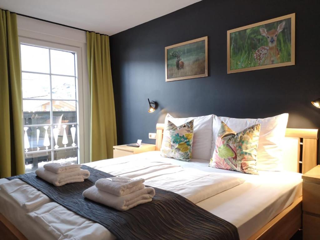 Postel nebo postele na pokoji v ubytování Seehotel Sissi