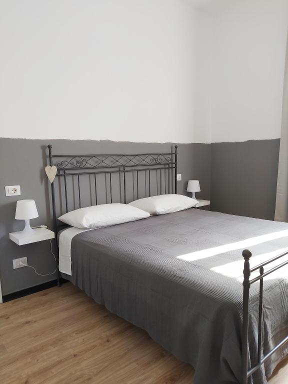 Posteľ alebo postele v izbe v ubytovaní B&B Casa Dalma