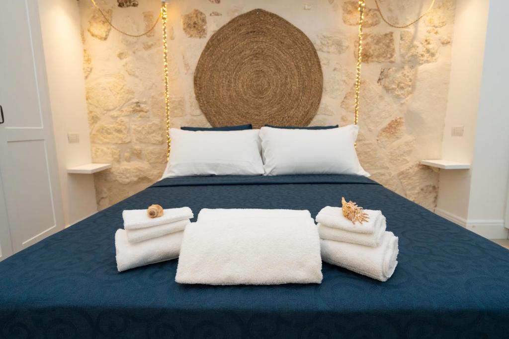 Postel nebo postele na pokoji v ubytování Corte Sant'Angelo