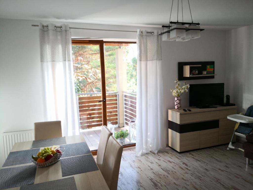 A television and/or entertainment centre at Apartament Anna