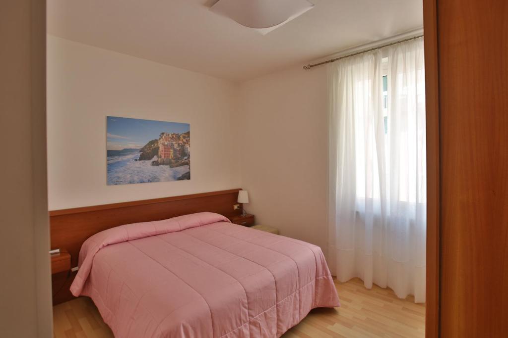 Postel nebo postele na pokoji v ubytování CATEO