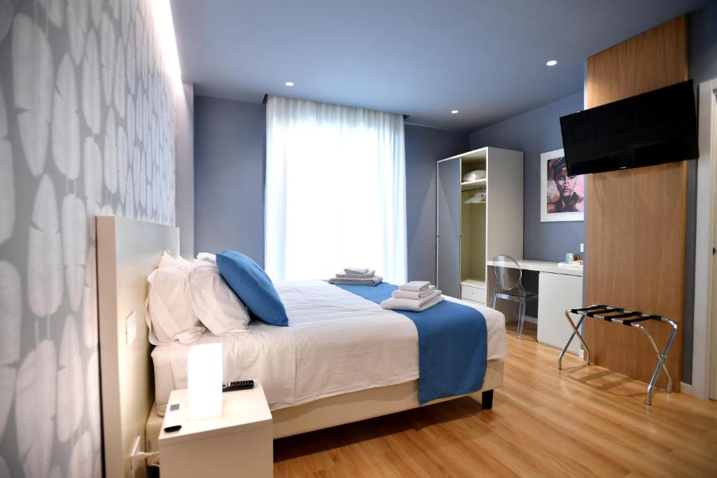 Postel nebo postele na pokoji v ubytování Nina B&B