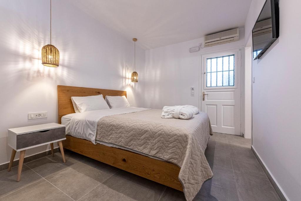 Postel nebo postele na pokoji v ubytování Gaia lux inn