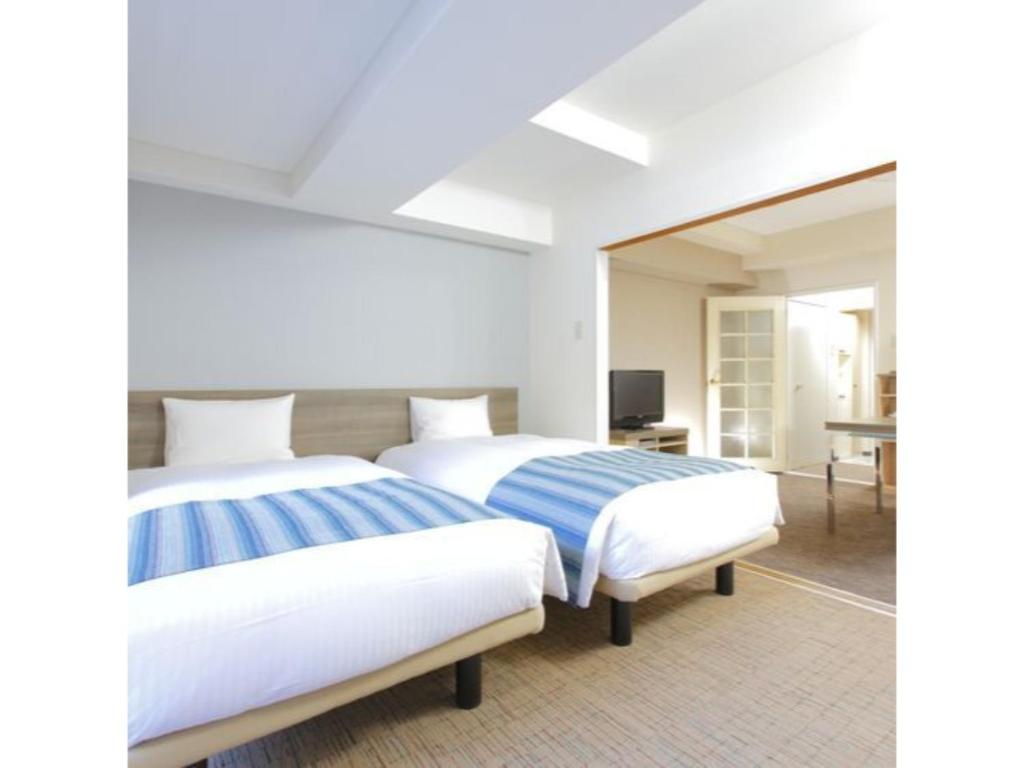 Cama ou camas em um quarto em HOTEL MYSTAYS Otemae - Vacation STAY 87117