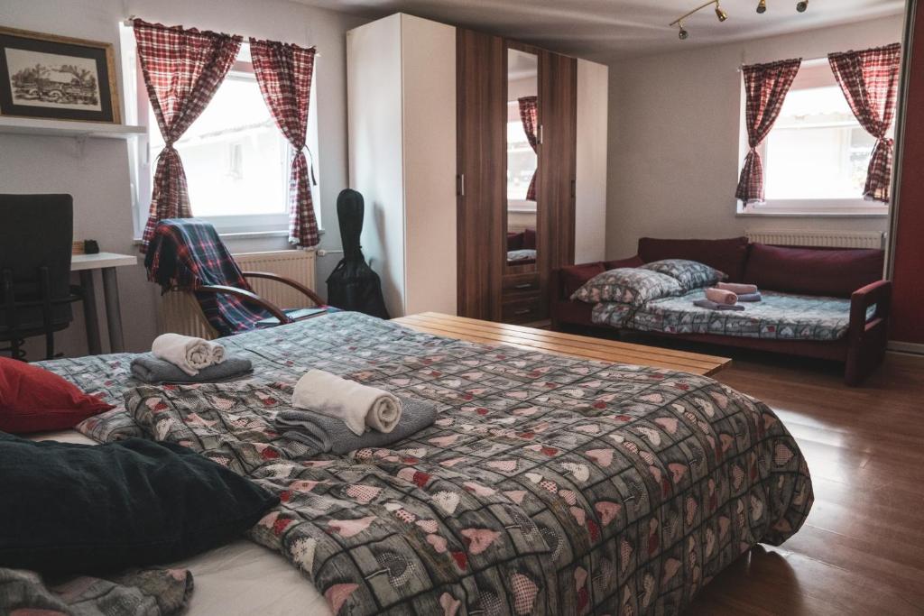 Postel nebo postele na pokoji v ubytování Učni ranč, Bohinj