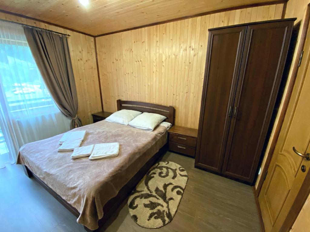 Postel nebo postele na pokoji v ubytování Під Магурою