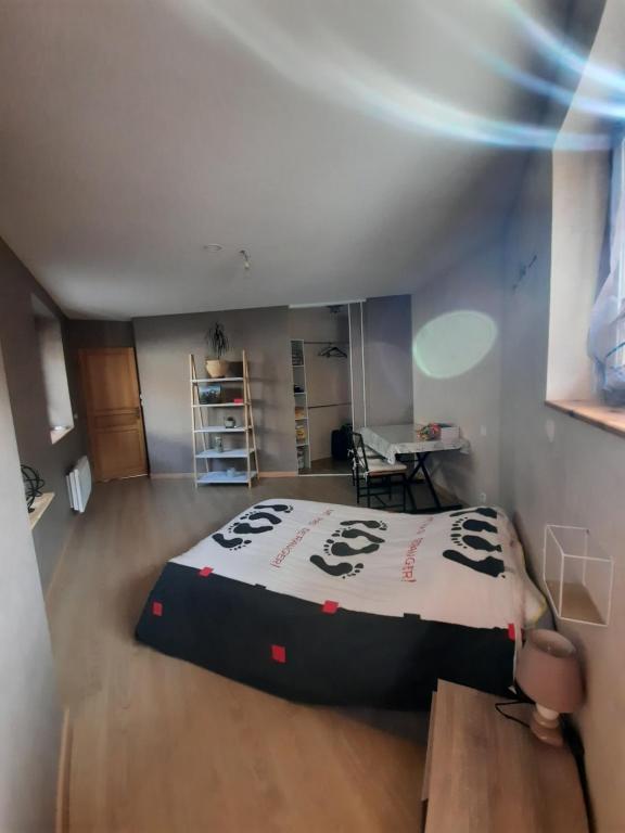 Postel nebo postele na pokoji v ubytování L'Arbonnaise