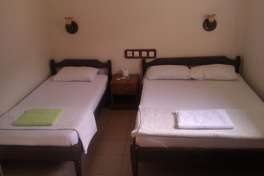 Postel nebo postele na pokoji v ubytování Pinara Pension & Guesthouse